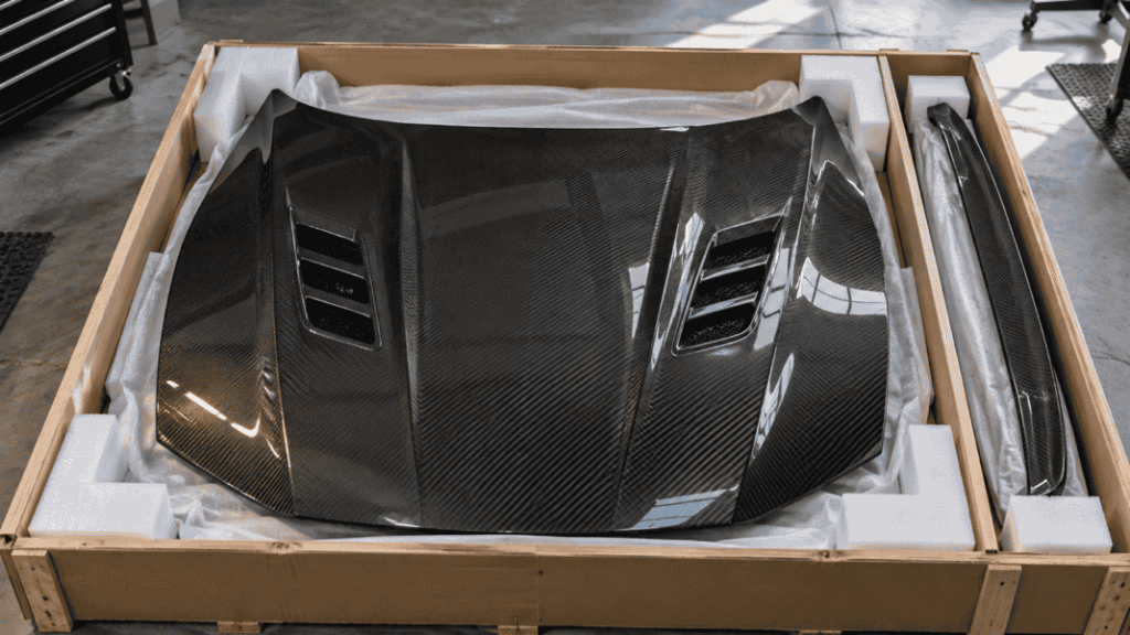 Concept of a carbon hood and long aero part protected for shipping