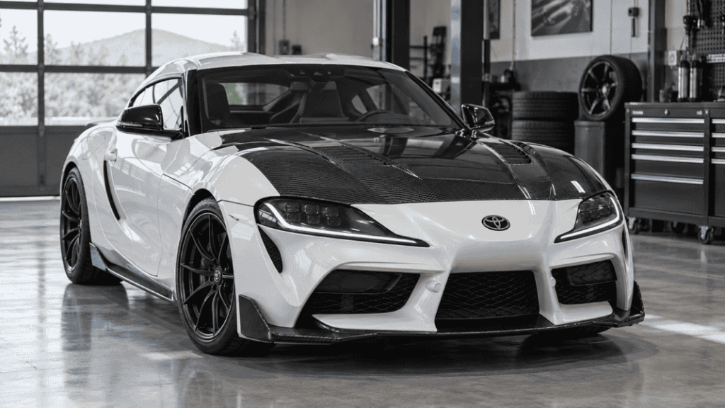 Concept of a Toyota Supra A90 with an exposed carbon hood