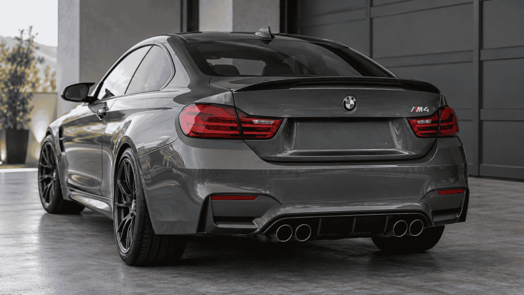 Concept of a BMW F82 M4 with a carbon trunk spoiler