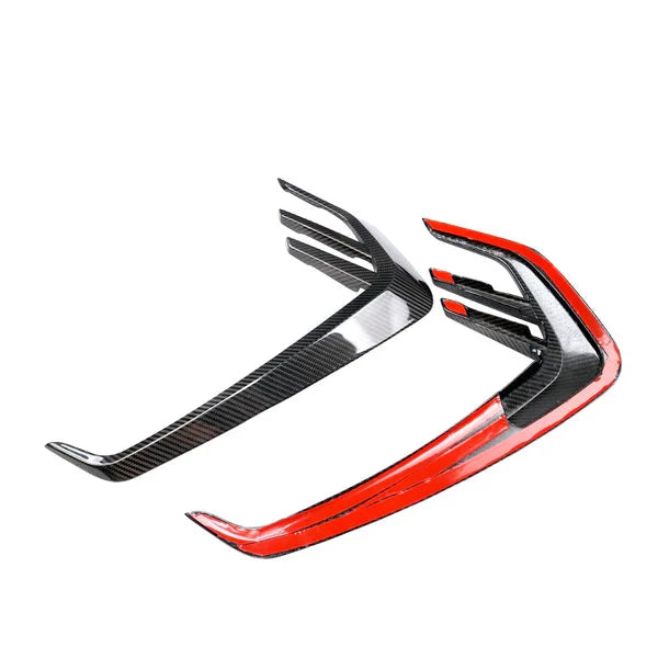 Reverse-side view of fender trim with red attachment backing visible.