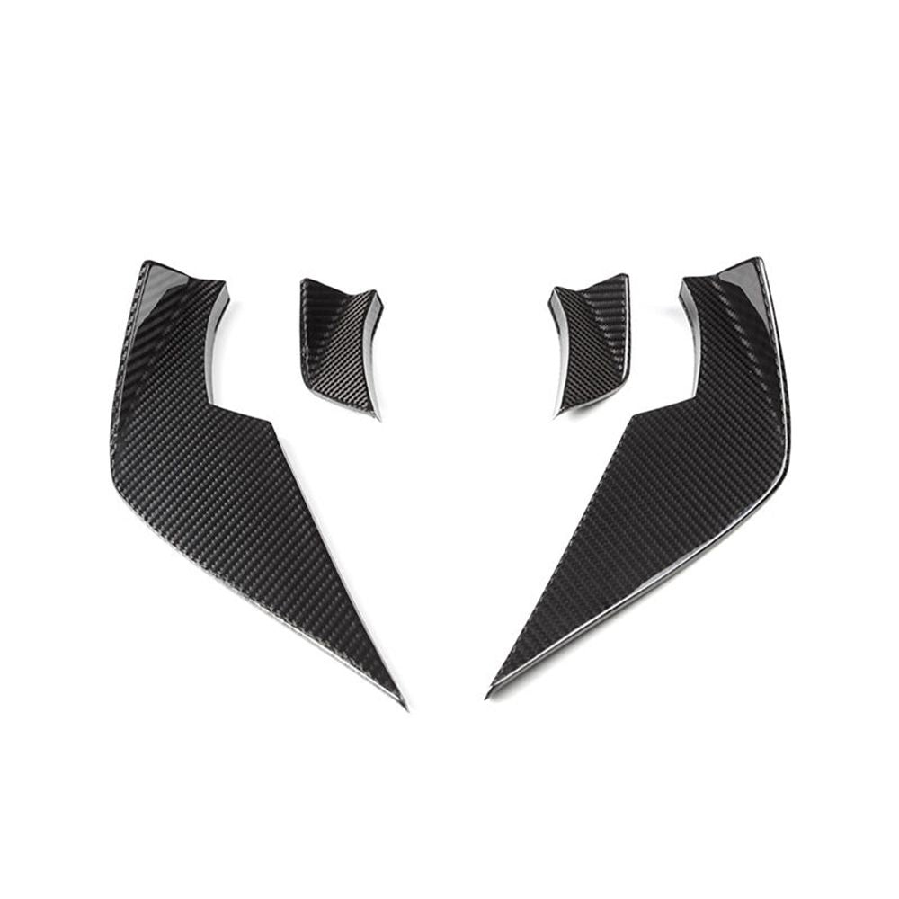 Four bumper canard pieces with two different profiles.