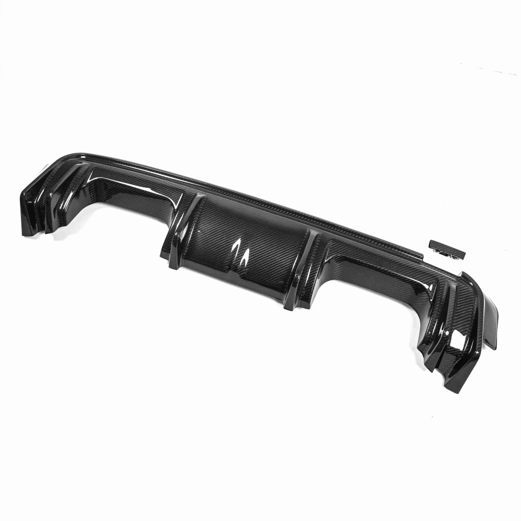 Rear diffuser viewed from an angle with fins and mounting features.