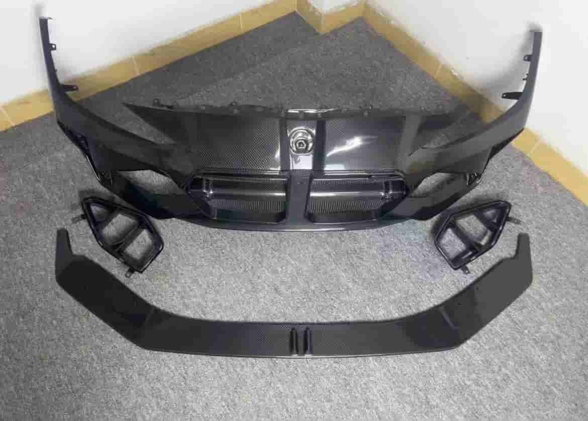 Top-angle layout of a bumper cover and trim pieces.