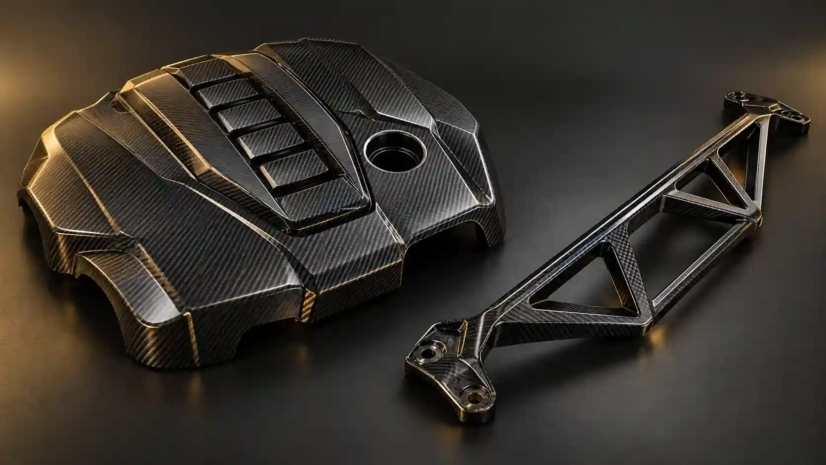 Illustration comparing a decorative carbon engine cover with a separate engine-bay brace.