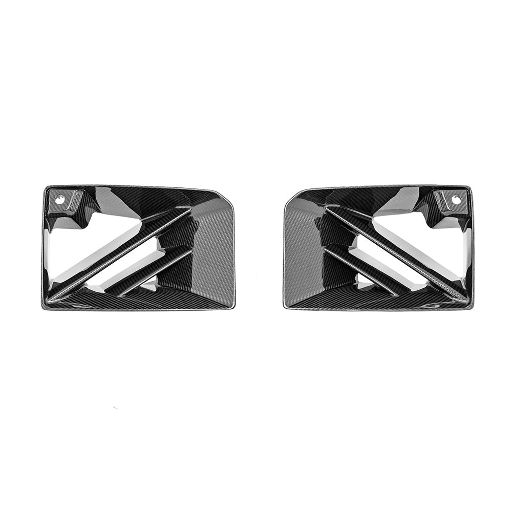 Pair of rectangular bumper vent pieces with diagonal bars.