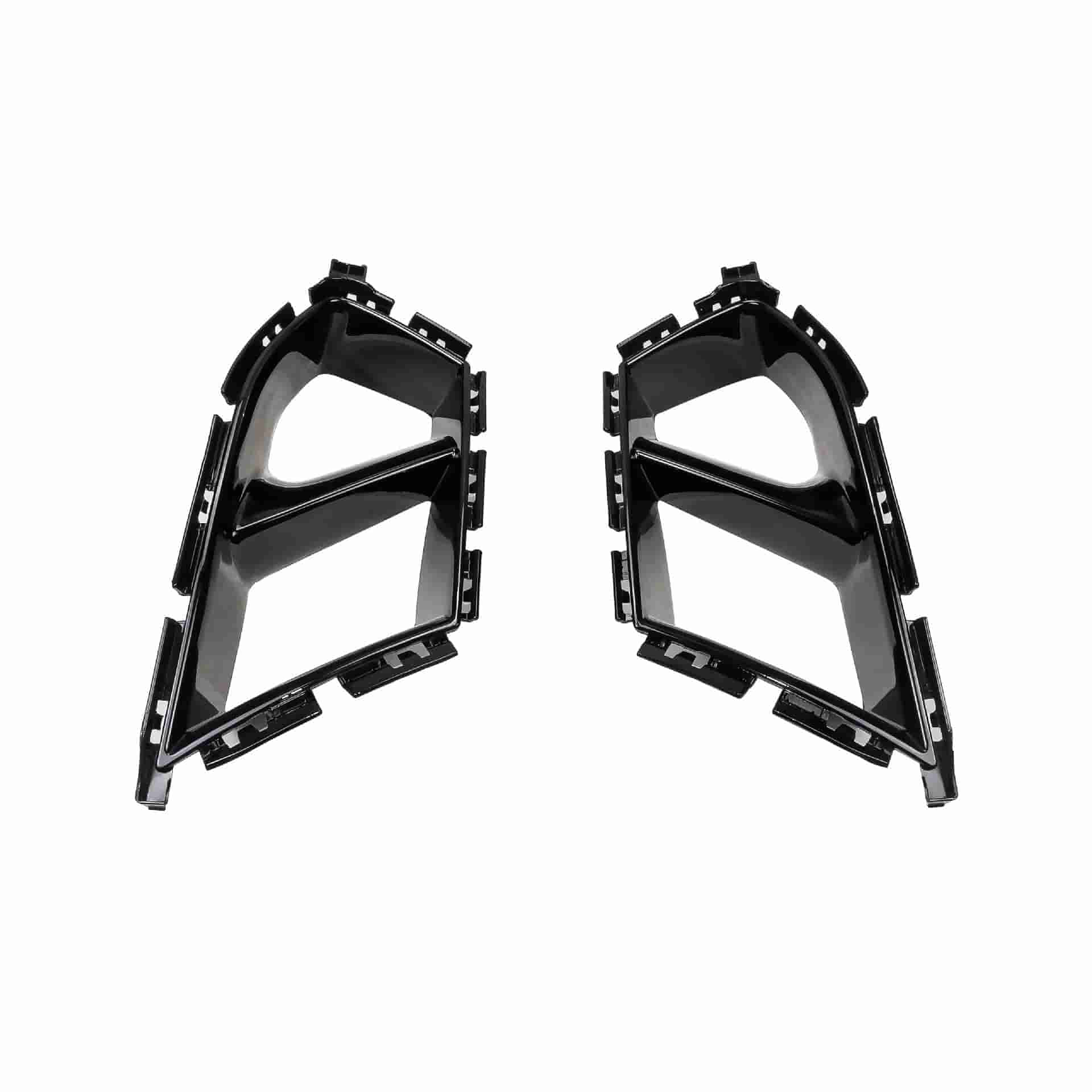 Two gloss black grille insert frames with attachment tabs.