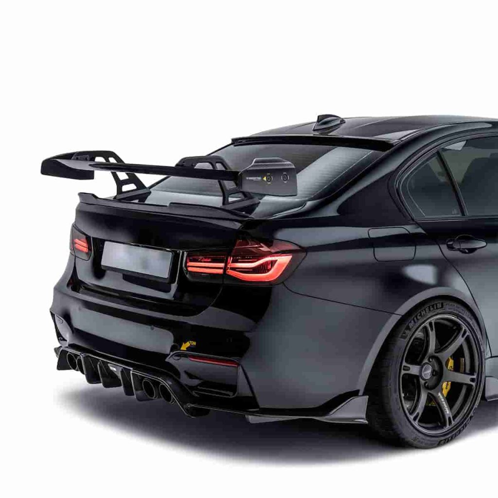 Rear-quarter vehicle reference with a raised wing.