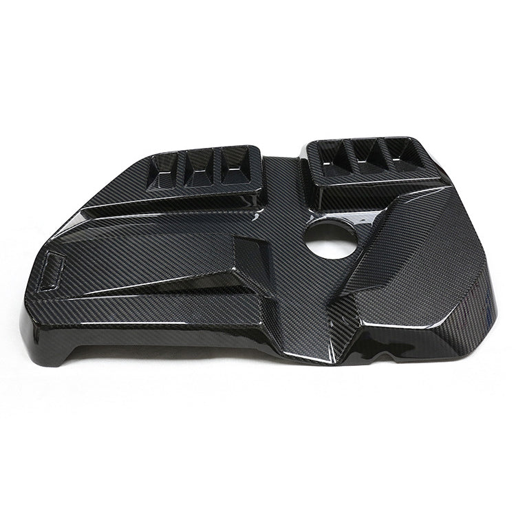 Angled view of a sculpted engine cover.