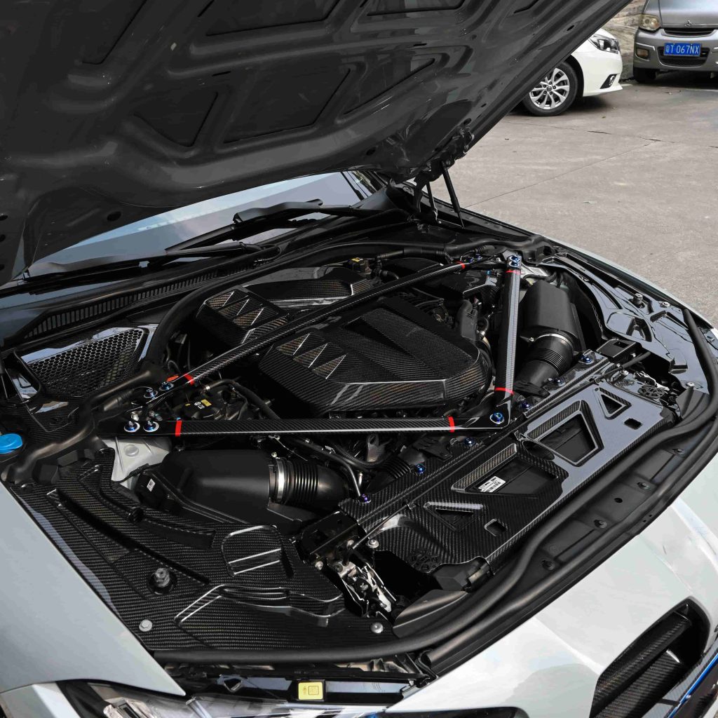 Engine-bay installation reference showing front trim.