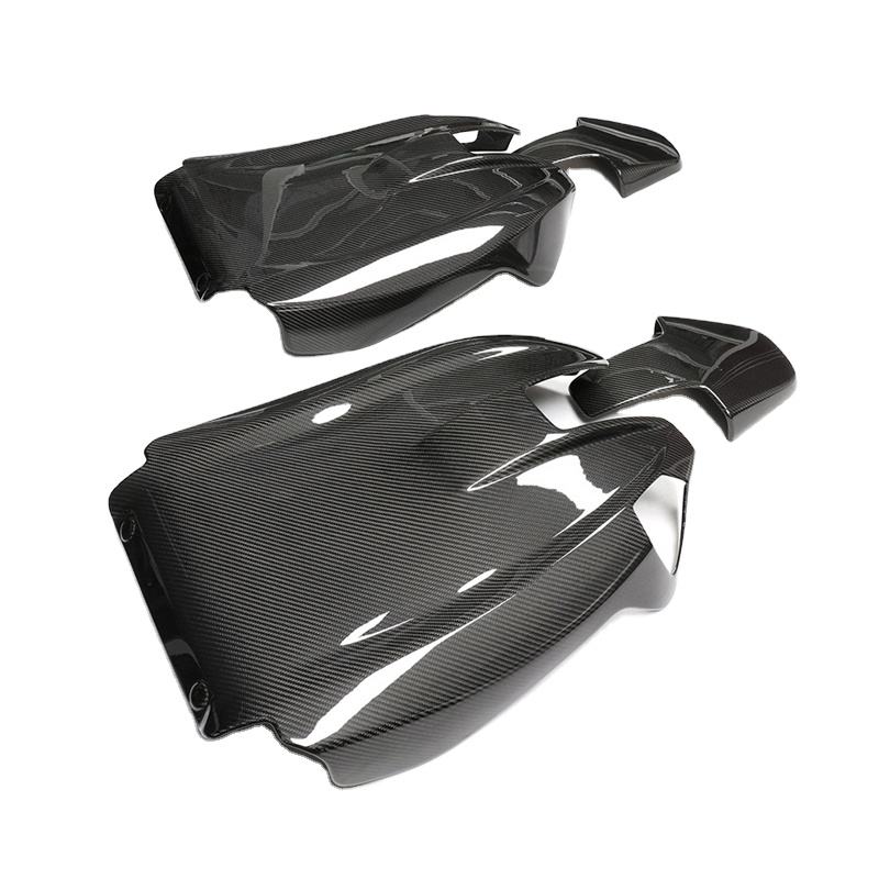 Pair of seat-back shells with upper openings.