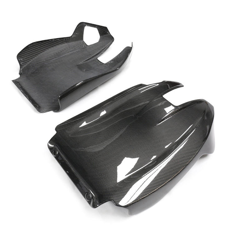 Angled view of two seat-back shells.