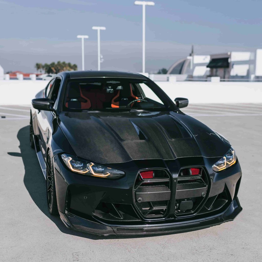 Front-quarter styling reference of a dark BMW.