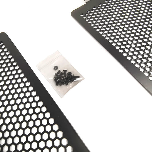 Perforated plates and a small bag of fasteners.
