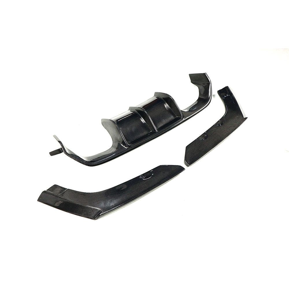 Rear diffuser center section and separate outer pieces laid out together.