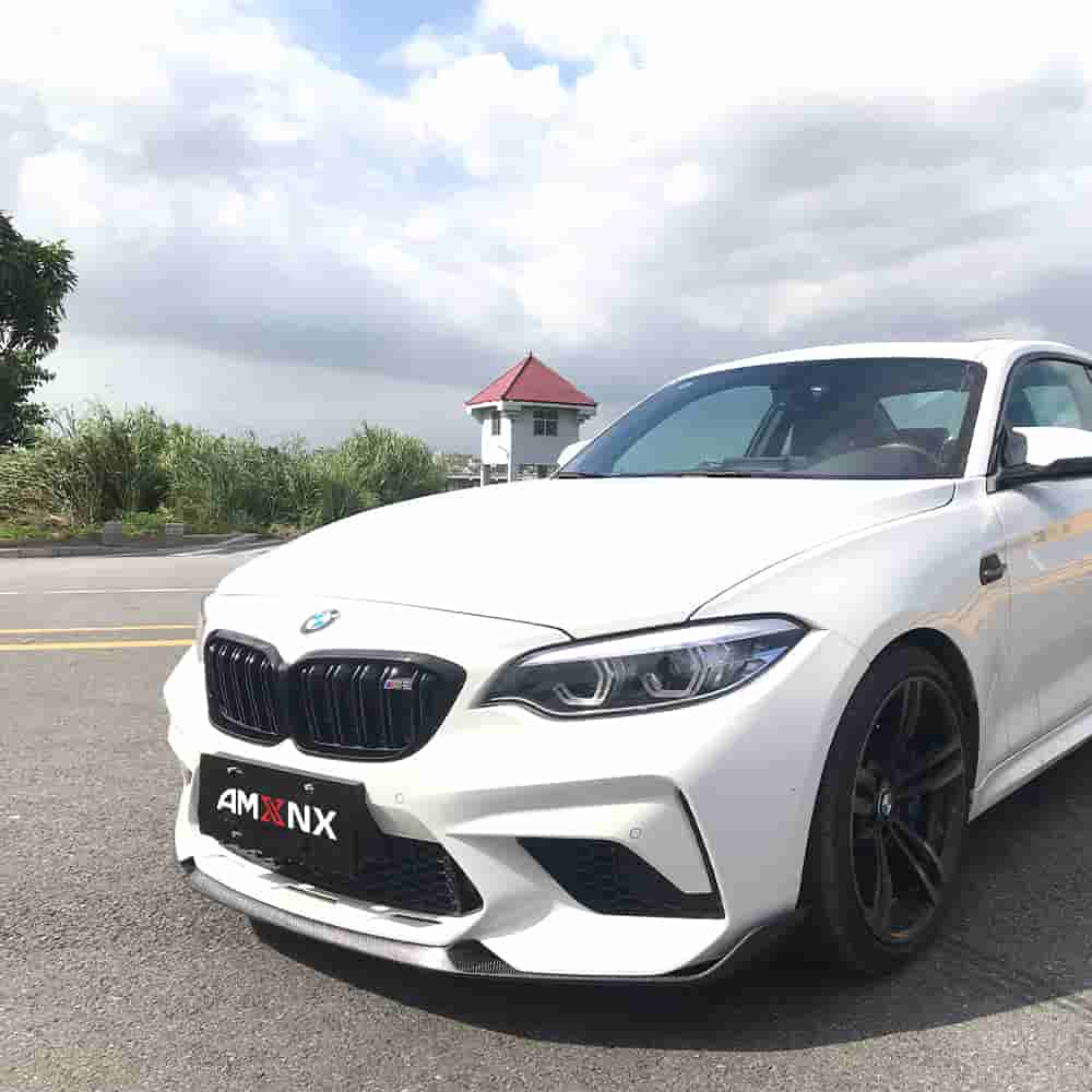 Front-quarter view of a white BMW.