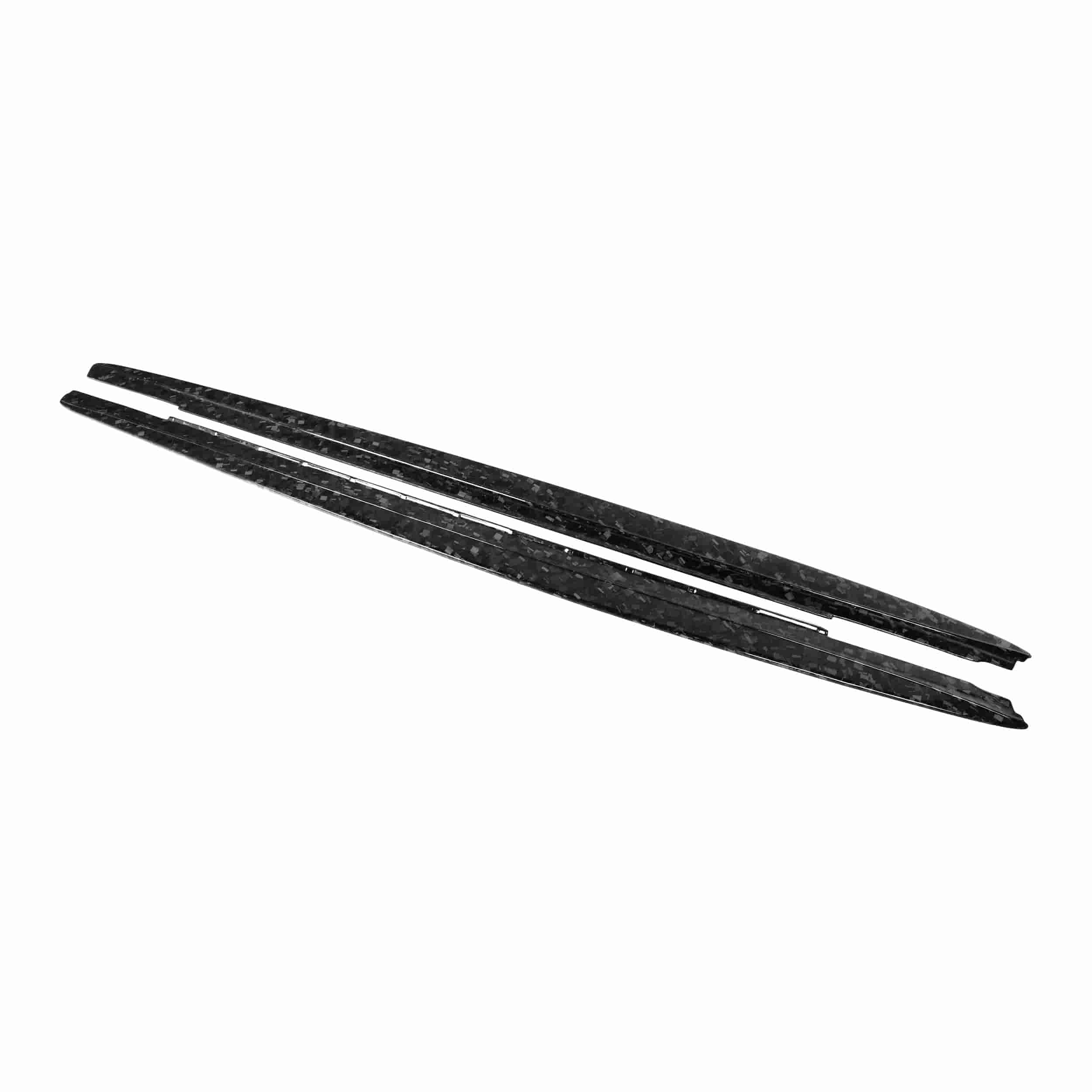 Two long side skirt pieces with an irregular patterned surface.