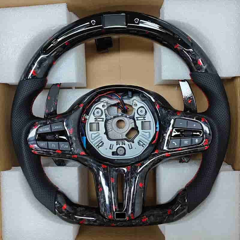 Steering wheel reference showing spoke trim with the central assembly removed.