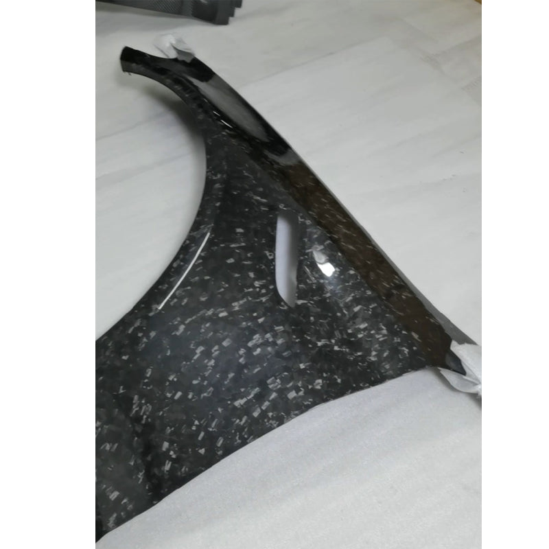 Partial view of a patterned fender panel.