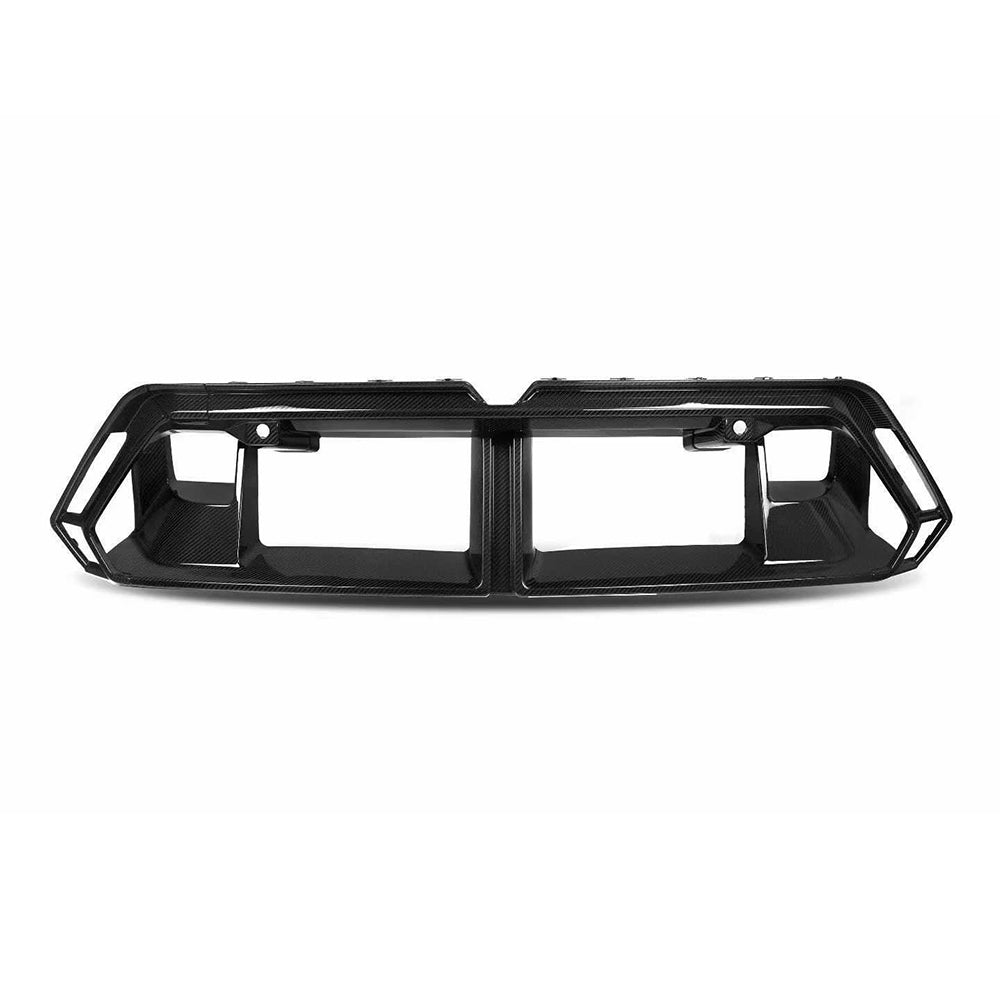 Wide lower grille frame with rectangular openings.