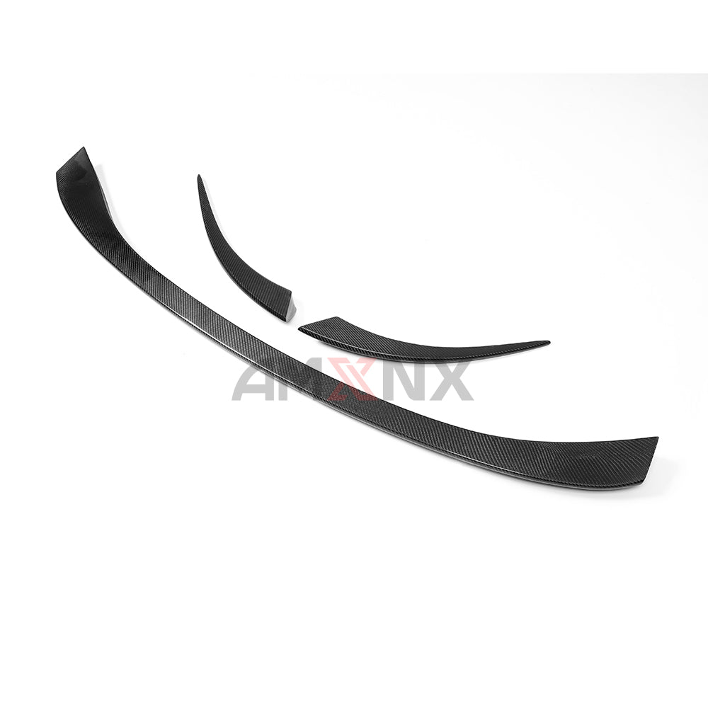 Angled view of three curved rear trim pieces.