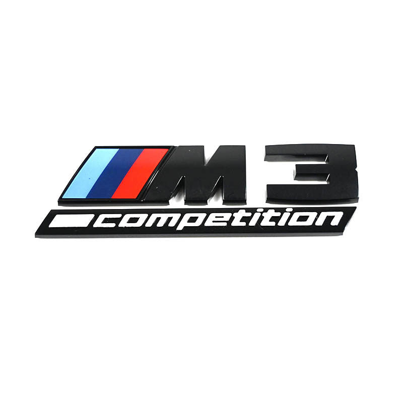 Close view of an M3 Competition badge.