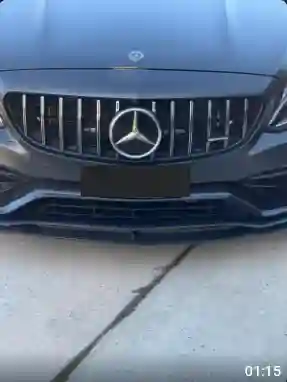 Customer-supplied front view of a Mercedes-Benz after the reported carbon part installation.